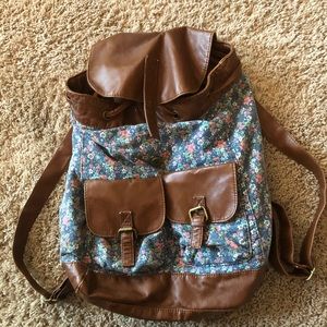 Leather and cloth patterned backpack